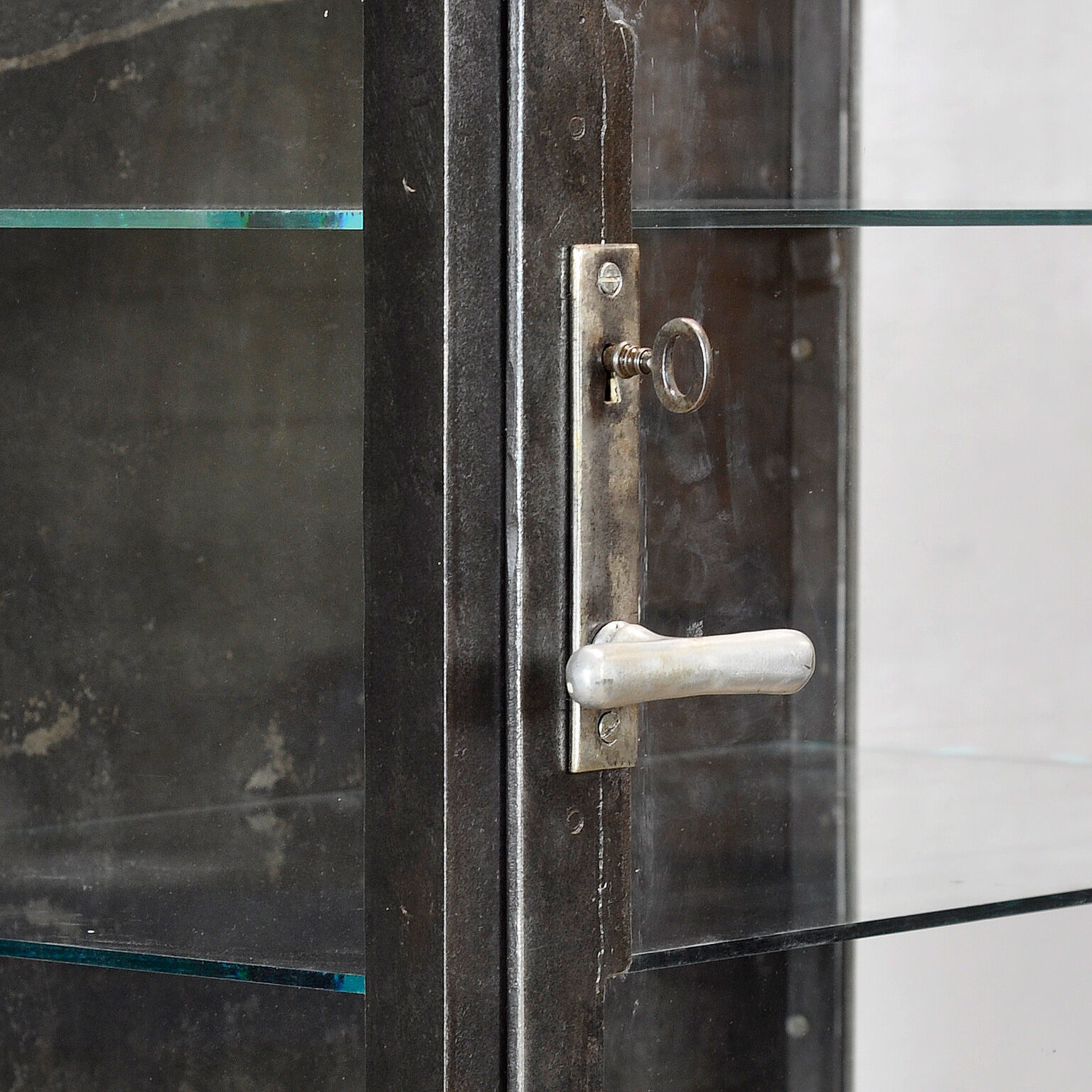 Polished iron medical cabinet, 1930s