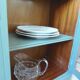 English sideboard, shallow, smoky green, wooden top.