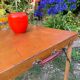 Old suitcase, table and stools, vintage wooden picnic