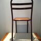 Chaise en bois et métal bordeaux