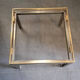 Table basse Guy Lefèvre en acier et laiton