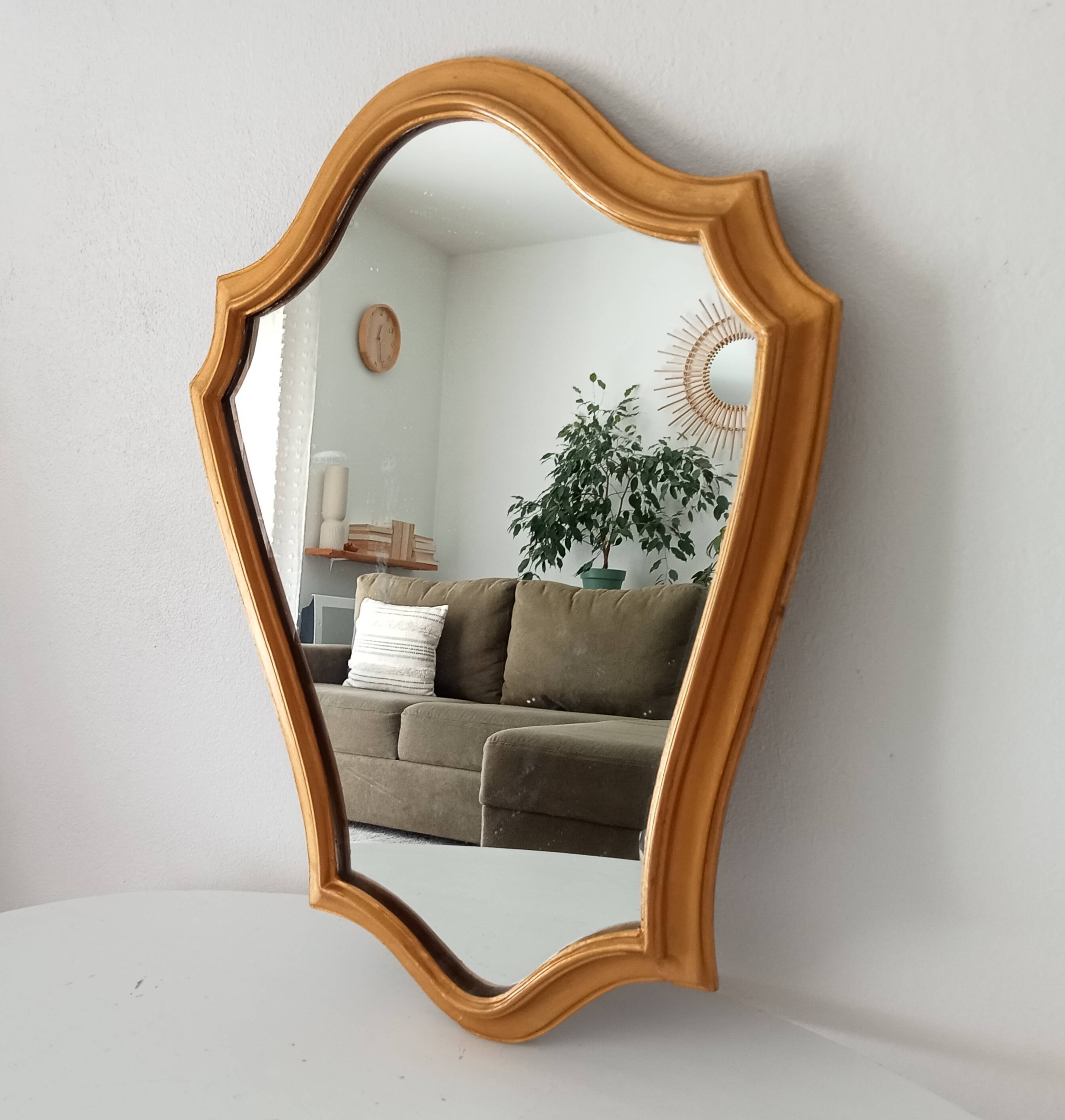 Vintage baroque mirror in gilded wood