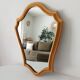 Vintage baroque mirror in gilded wood