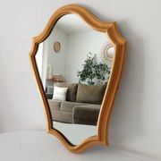 Vintage baroque mirror in gilded wood