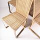Suite de 4 chaises vintage en métal doré et osier