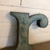 Blue sign letter "R"