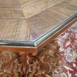 Tripod table with a sculpted top