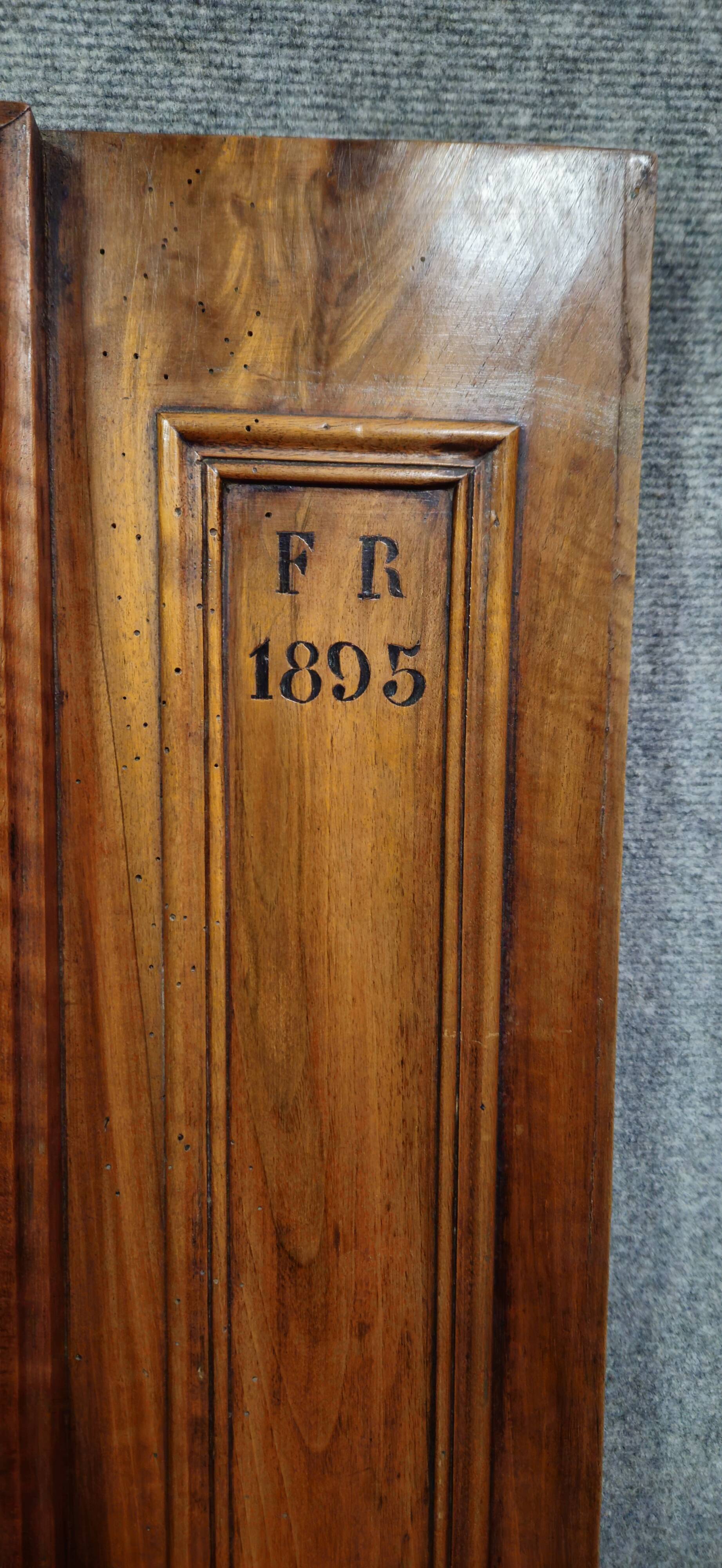Pair of walnut wardrobe doors, dated 1895 / for cupboard