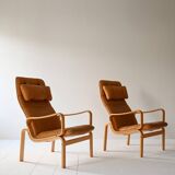 Vintage armchairs with cushions