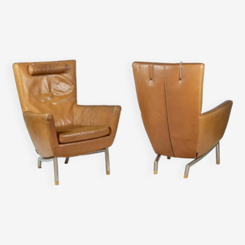 Gerard Van Den Berg. Pair of leather armchairs. 1980s.