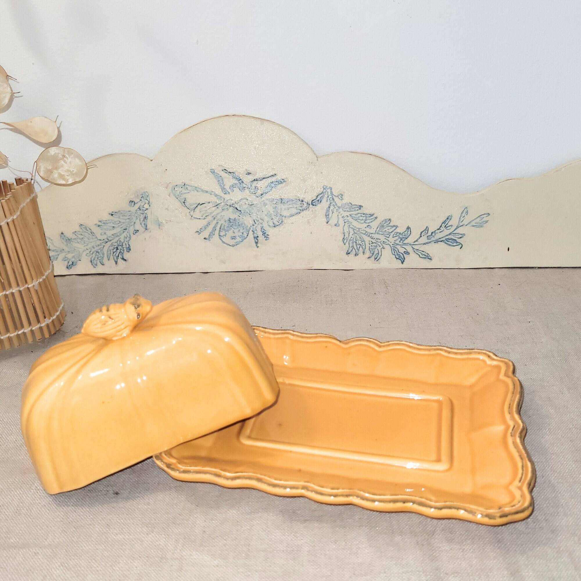 Antique yellow ceramic butter dish with bee decor, vintage Provençal style
