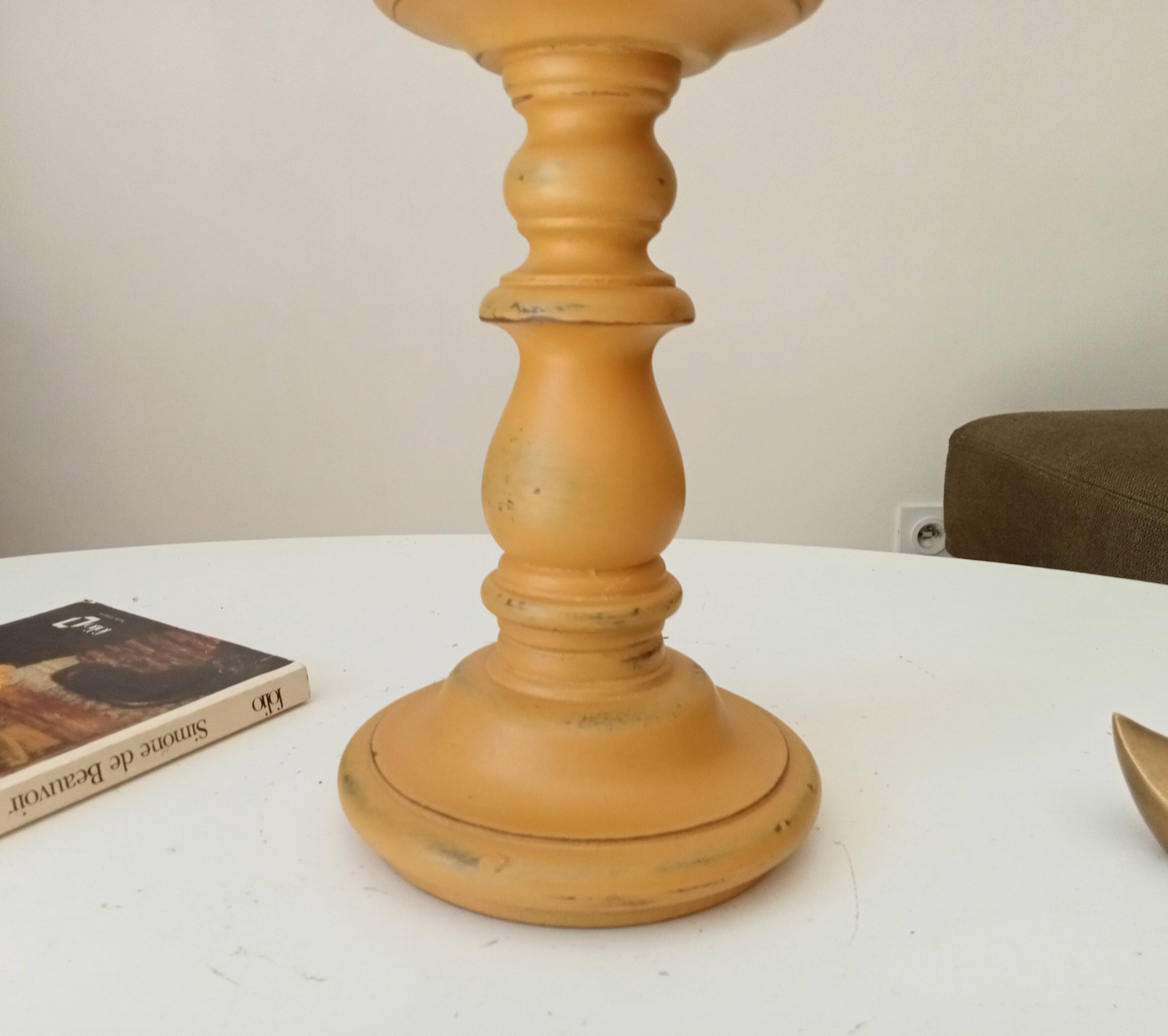 Vintage candle holder in weathered yellow wood