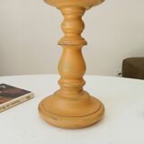 Vintage candle holder in weathered yellow wood