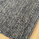 Tapis tressé en laine feutrée