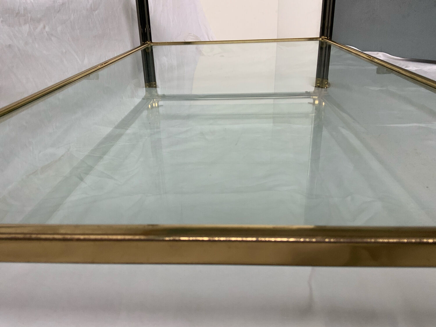 Glass and brass coffee table