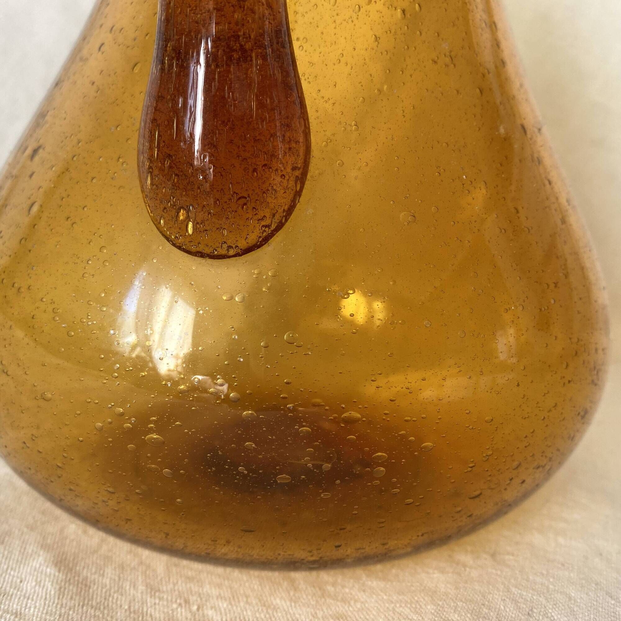 Blown glass jug with caramel bubbles