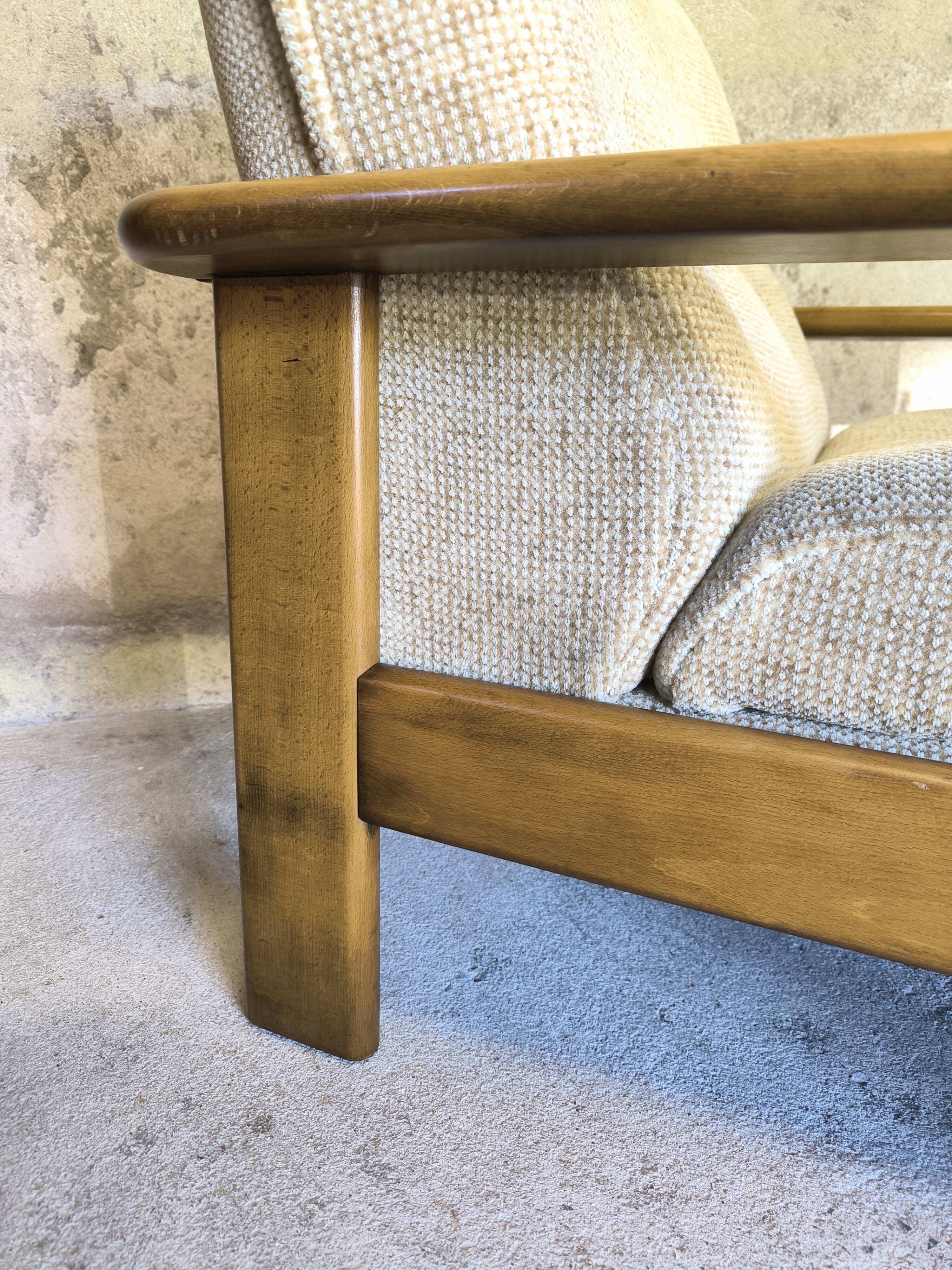 Fauteuil vintage en bois et laine