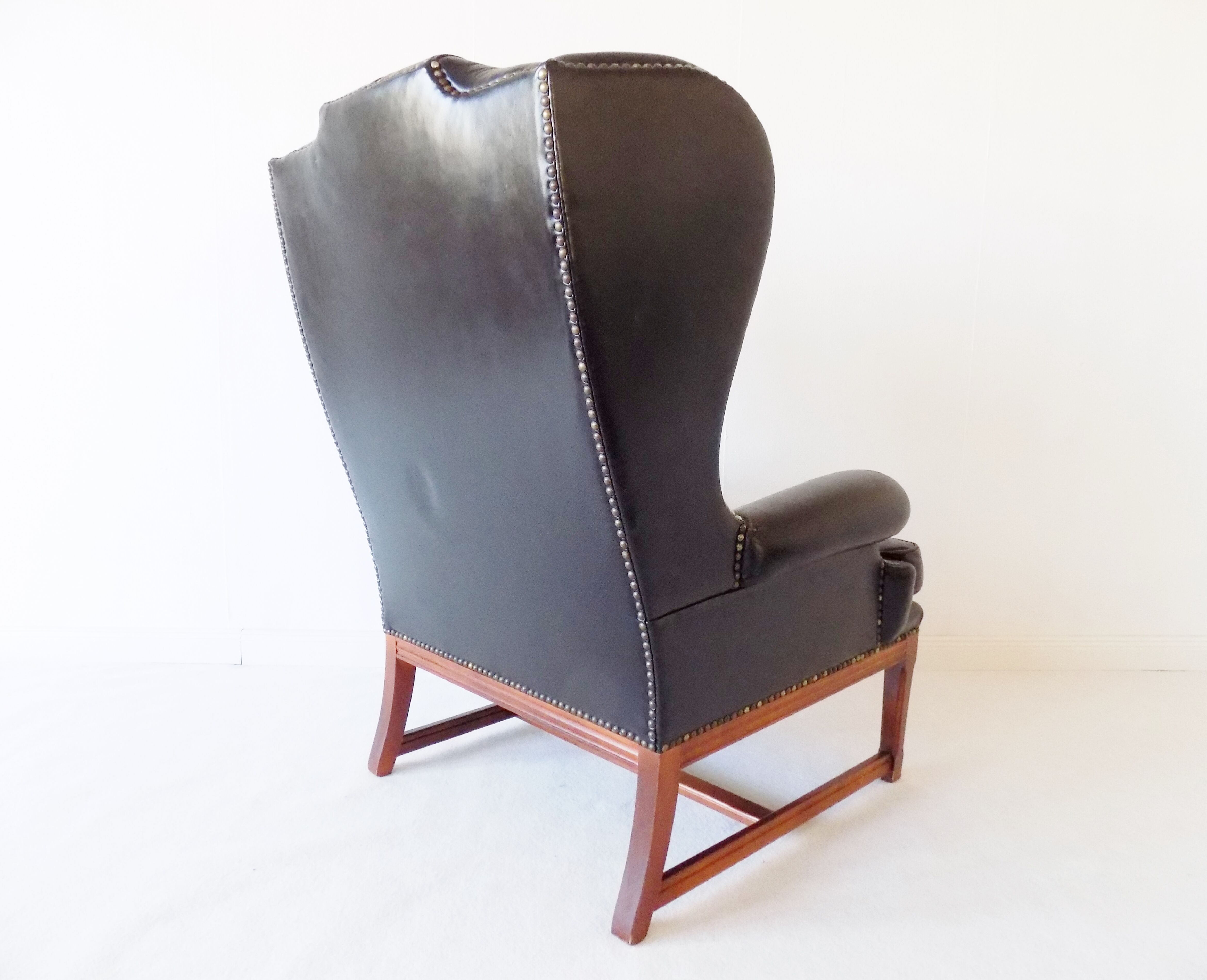 Chesterfield high back leather armchair black from the 1960s