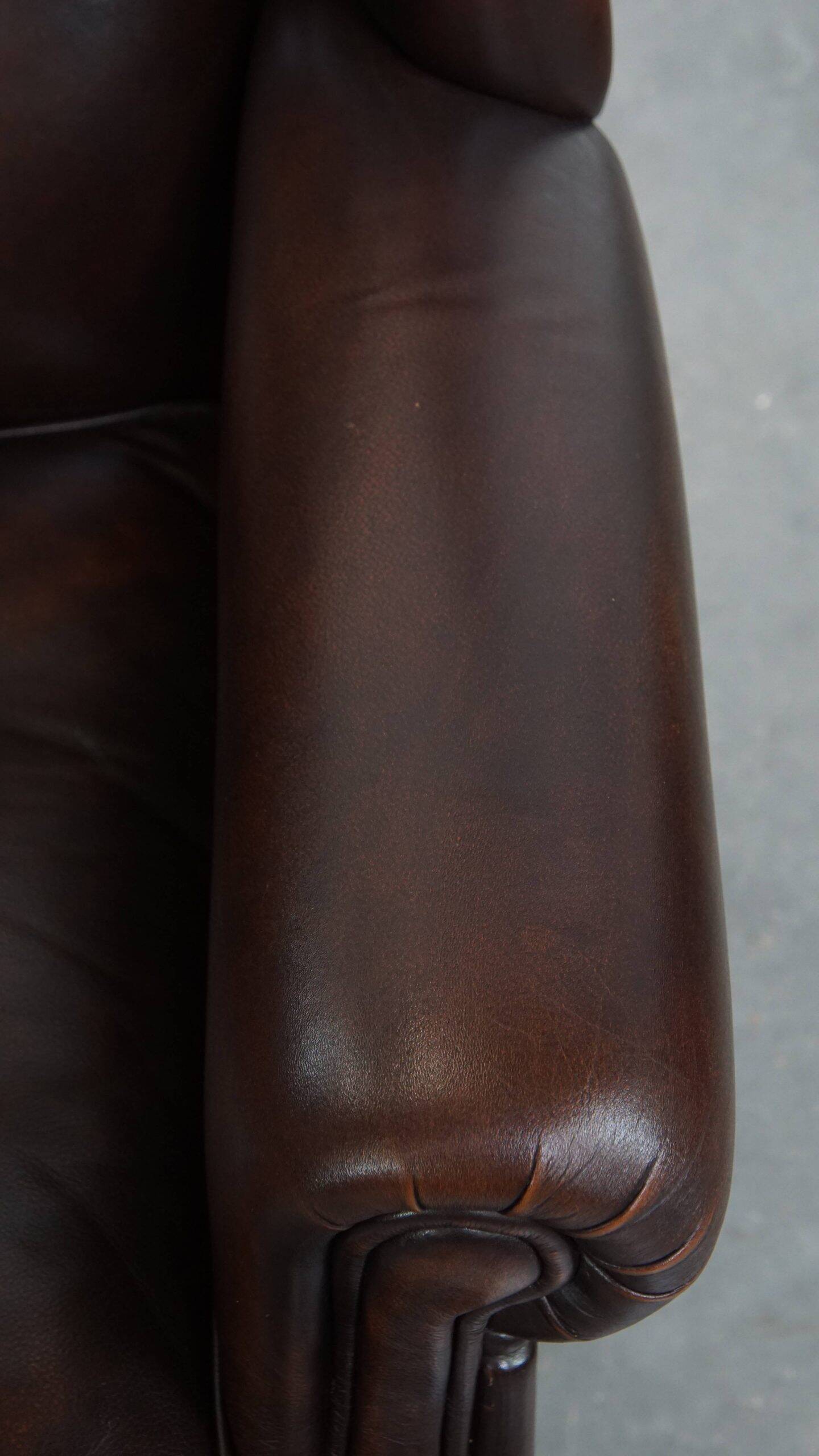 Very beautiful wing chair made of cowhide leather in English style