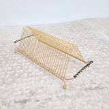 Vintage gold vinyl record holder from the 60s