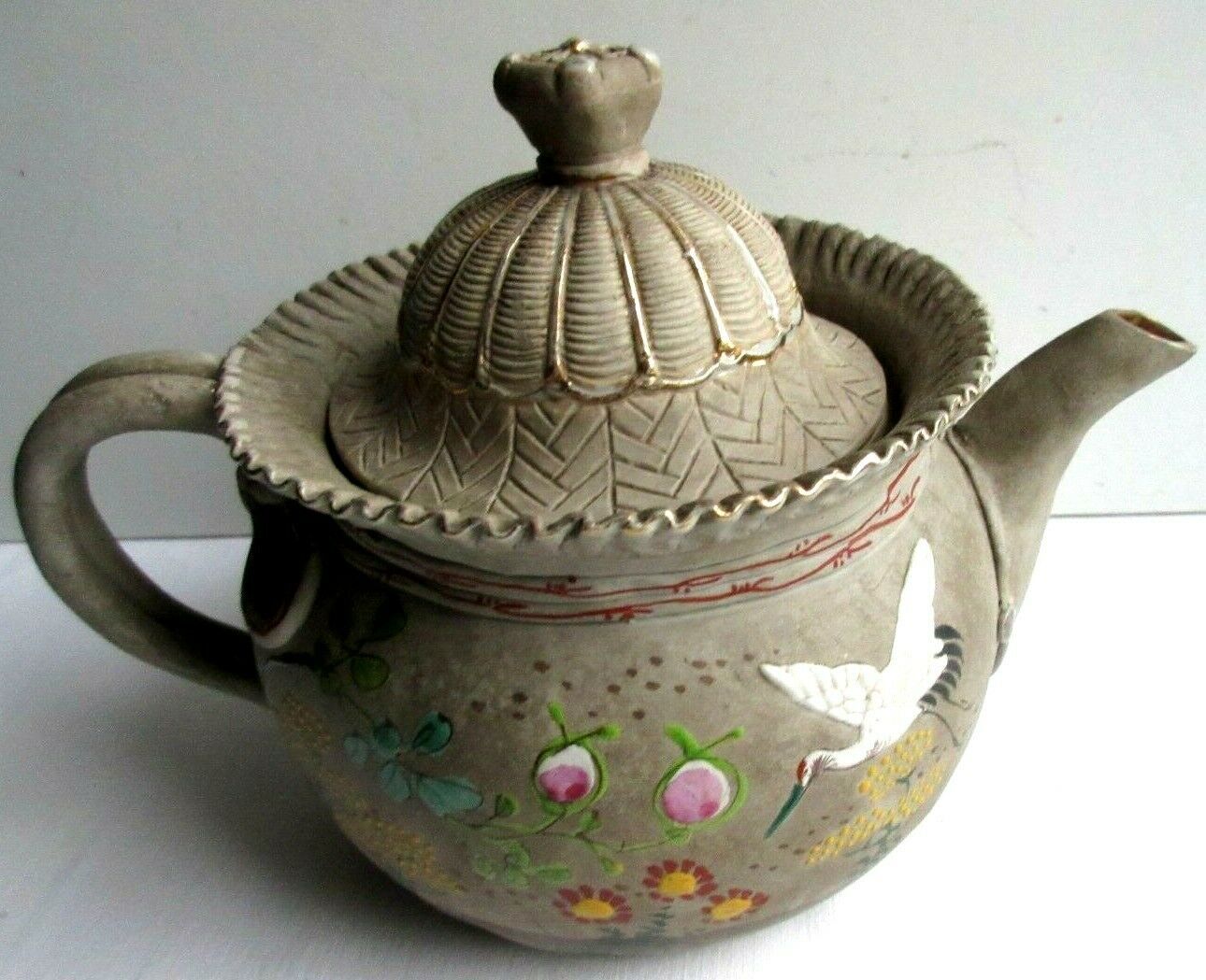 Japanese Art Deco teapot in porcelain biscuit enamelled with cranes and flowers