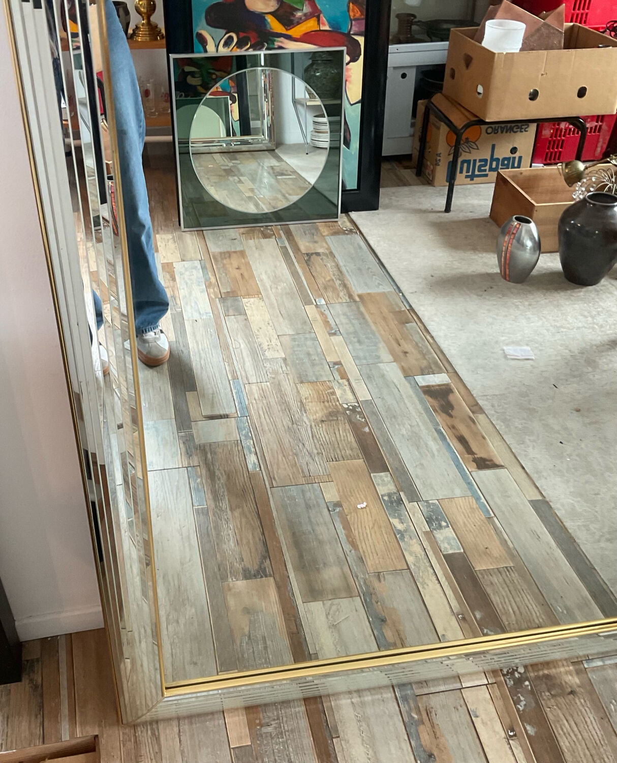 Large vintage Hollywood Regency style mirror with shutters.