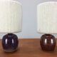 Pair of ceramic sandstone ball lamps and wool lampshades