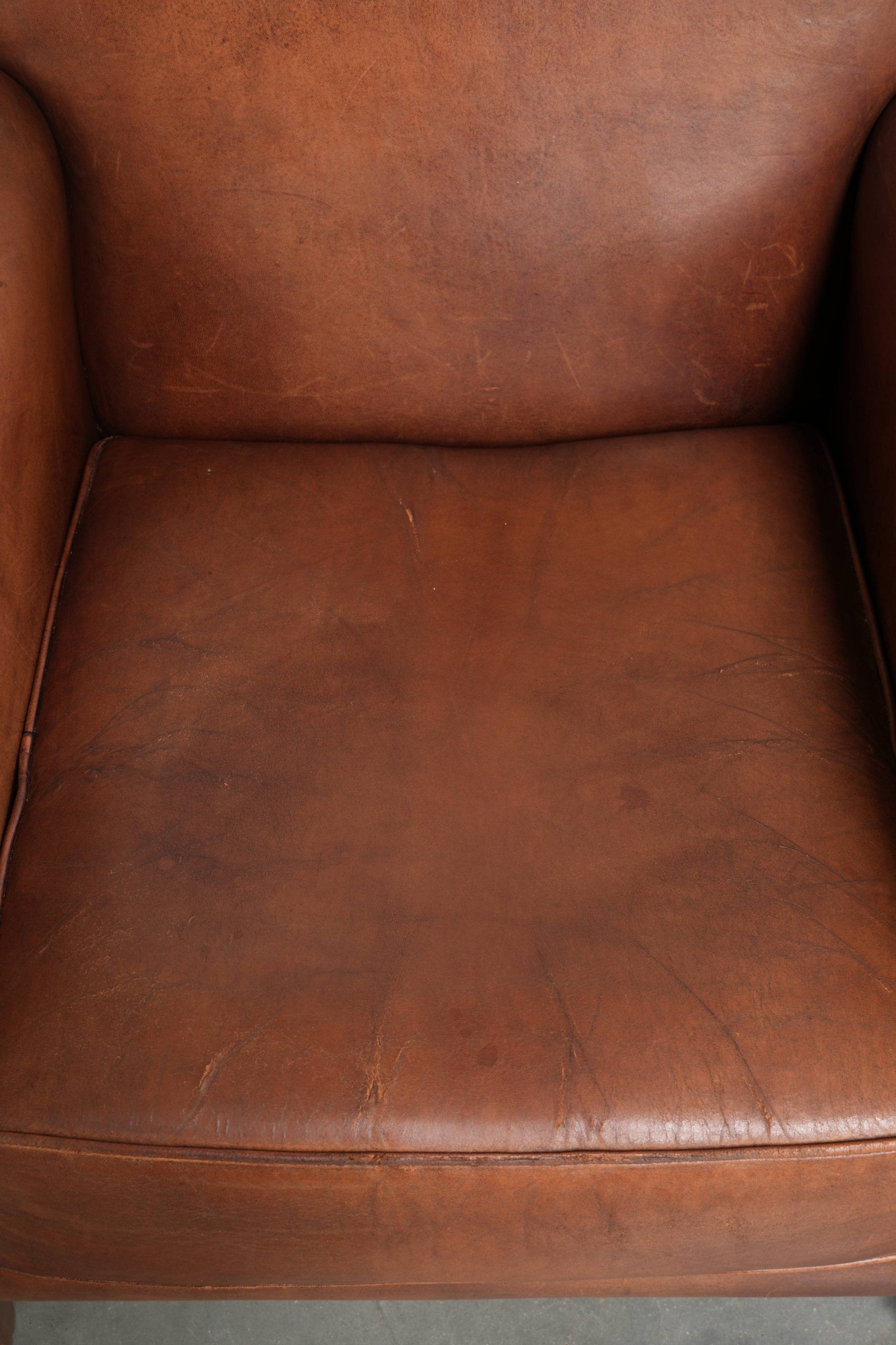 Comfortable set of sheepskin armchairs with and a timeless design