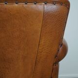 Fauteuil en cuir de mouton à l'aspect luxueux