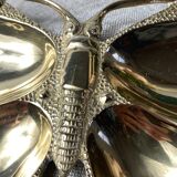 Butterfly-shaped brass pocket emptier