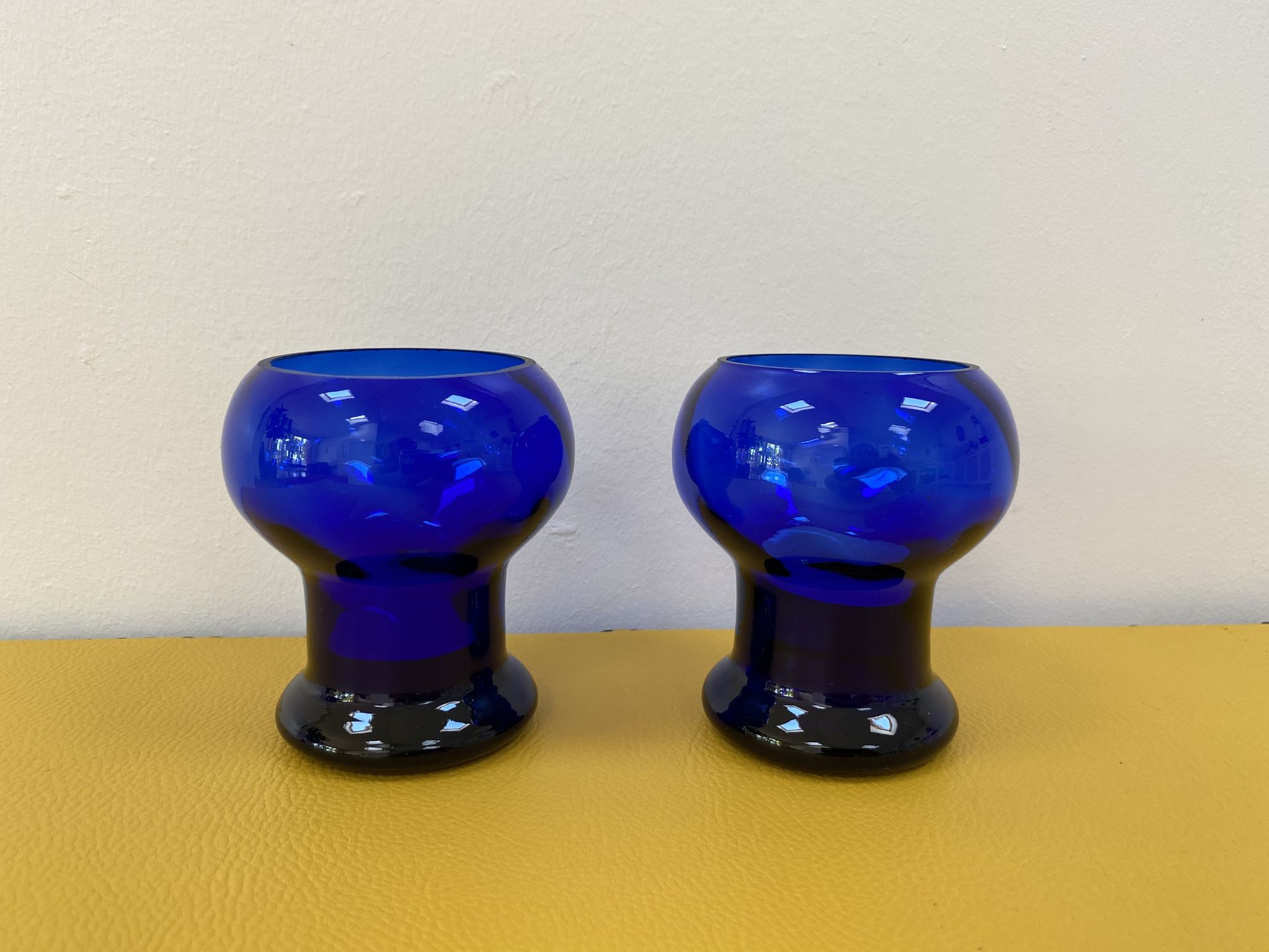 Duo of cobalt blue glass candlestick photophores