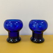 Duo of cobalt blue glass candlestick photophores
