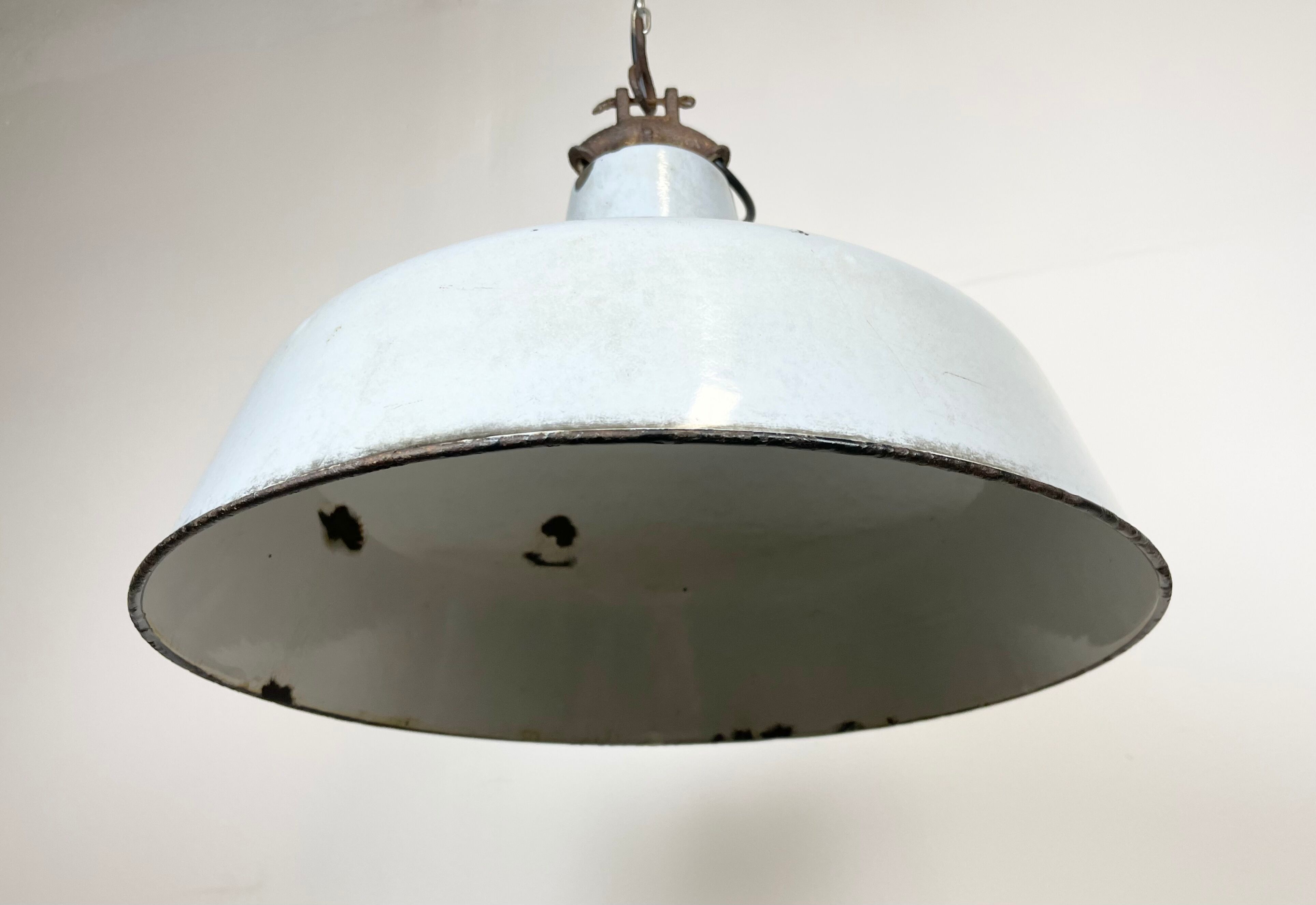 Industrial light grey enamel factory lamp with cast iron top, 1950s