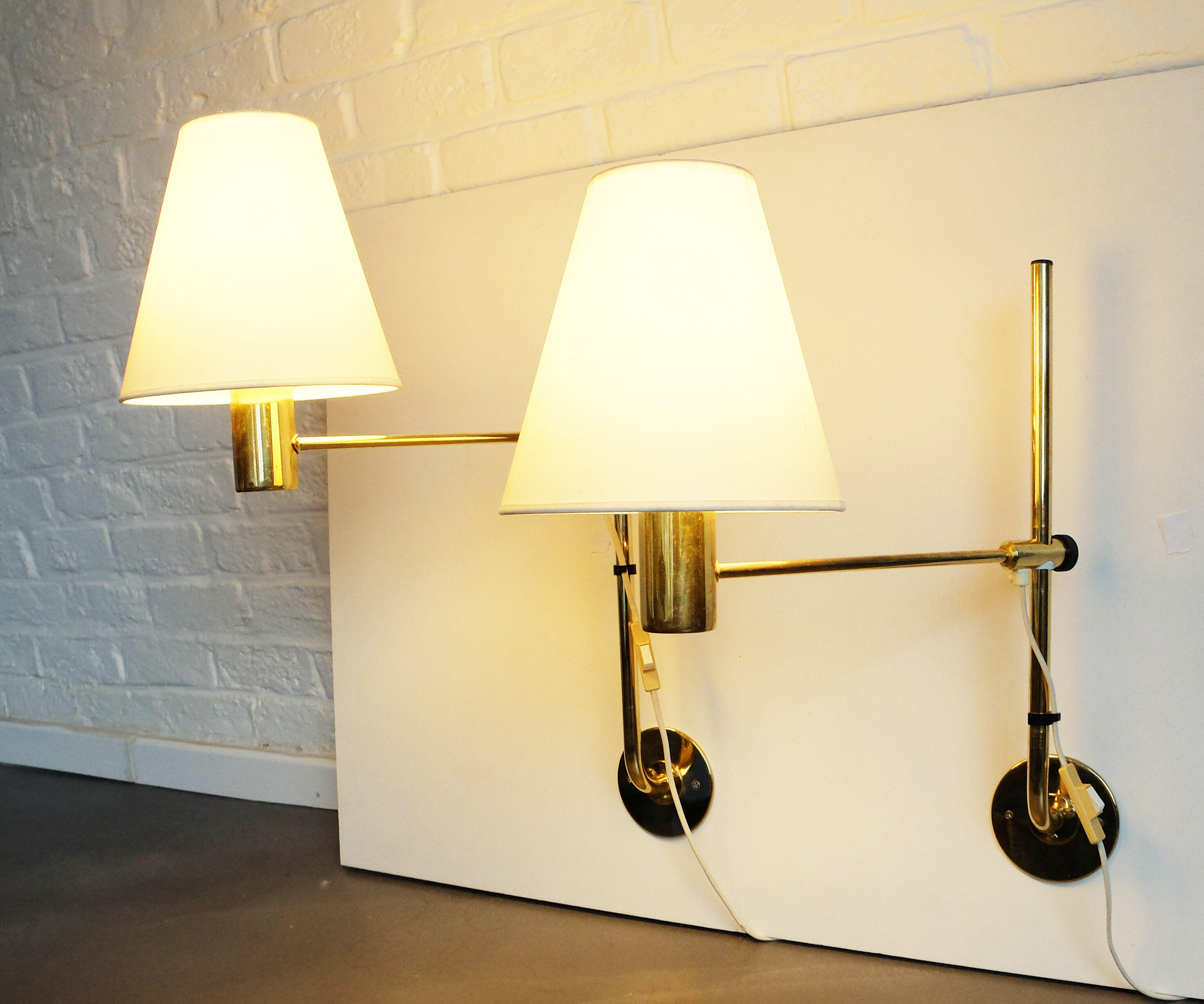 Pair orientable sconces V-393 Hans-Agne Jakobsson for AB Markaryd Sweden, brass