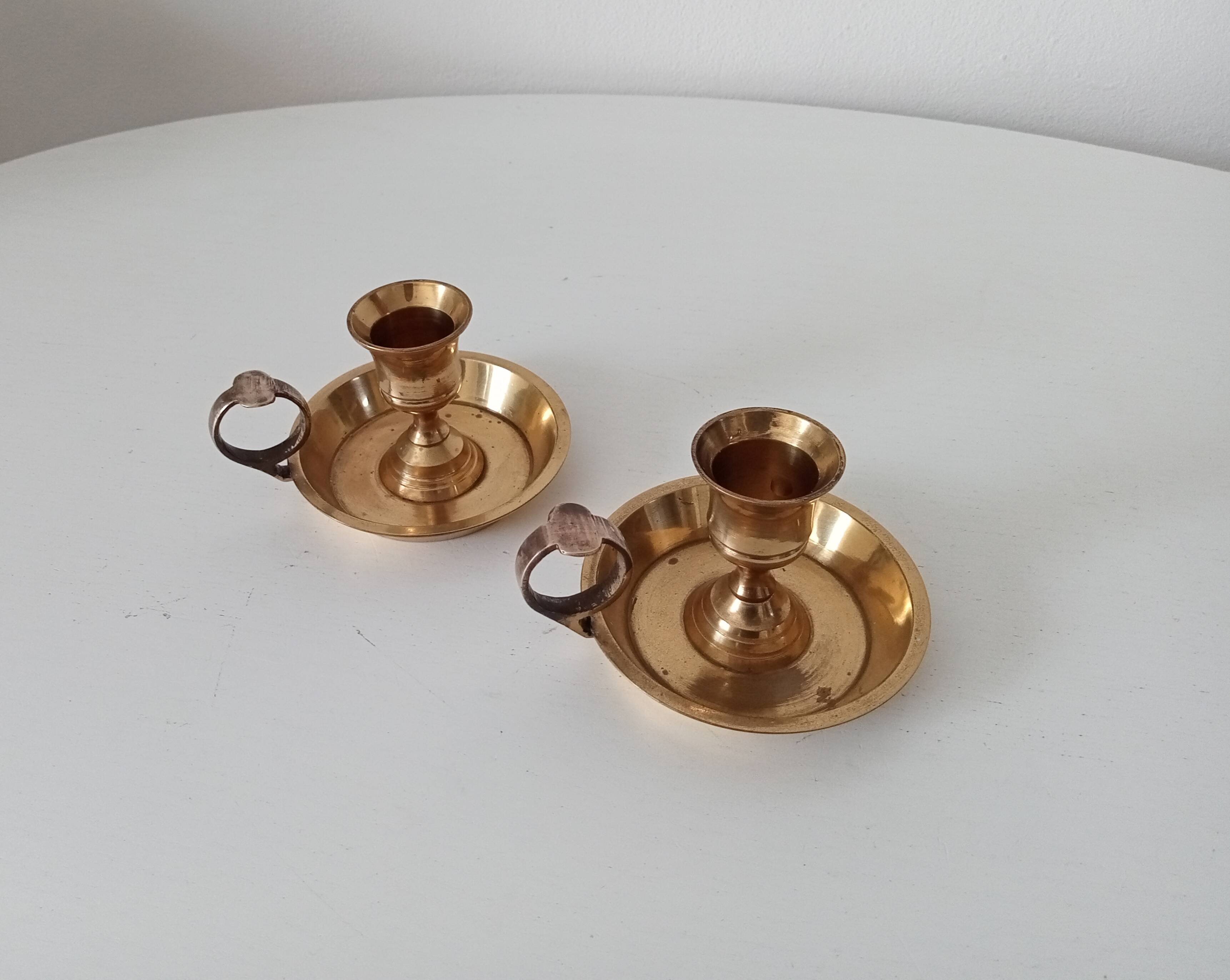 Vintage hand candle holder in solid golden brass