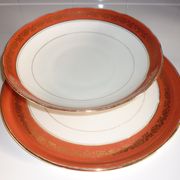 Lot assiette et plat en porcelaine de Limoges avec liseré orange et or