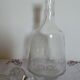 Hand-cut glass decanter, faceted glass cap