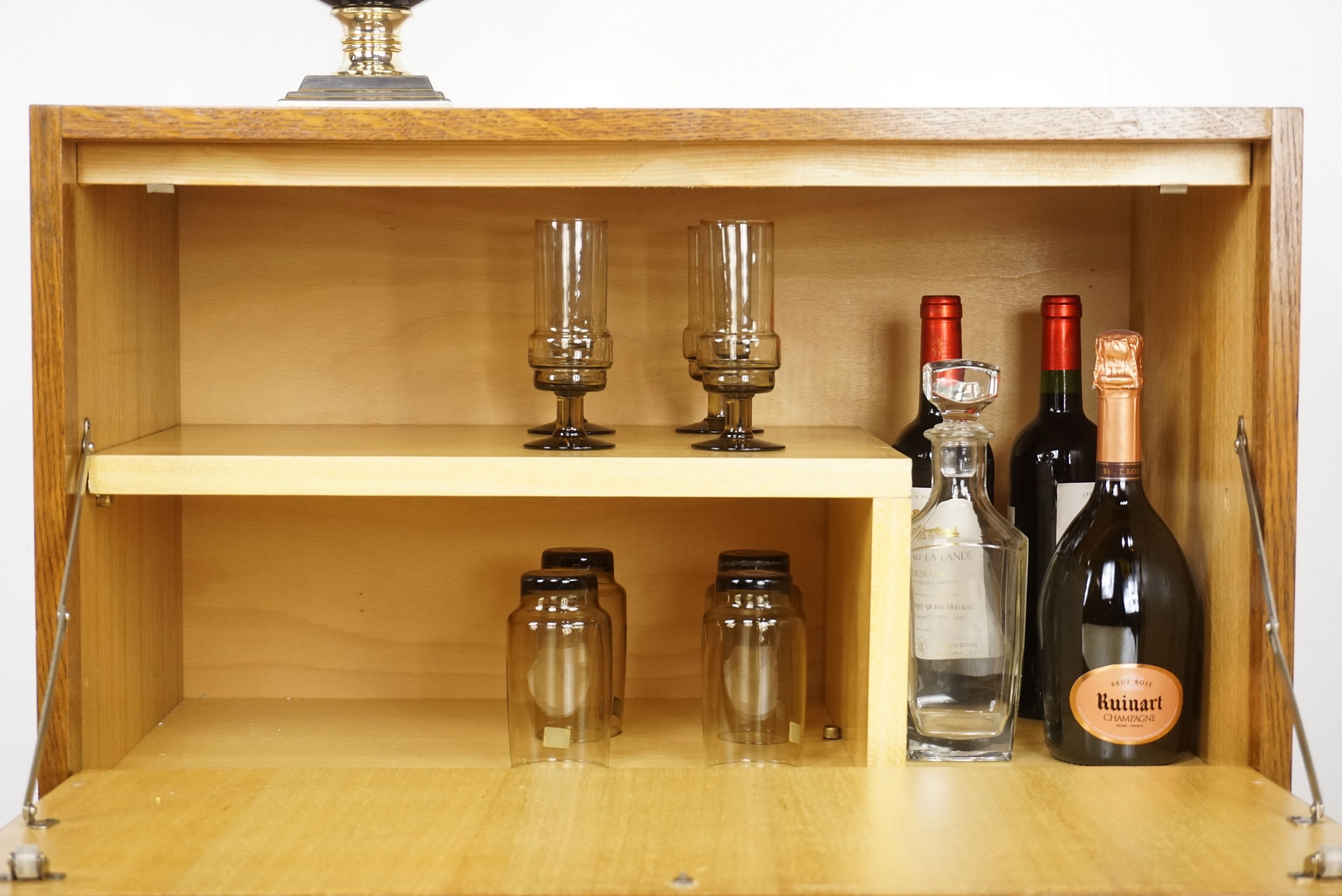 Bar storage in oak and brass, 50s - 60s