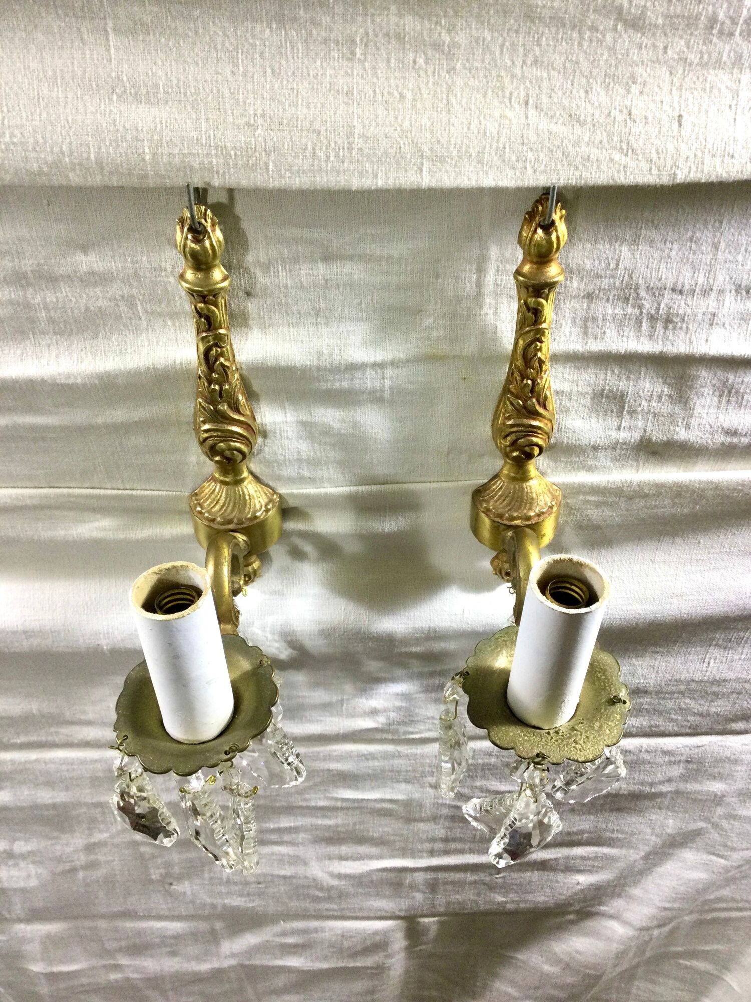 Pair of 1-light bronze sconces and Louis XV style stamps