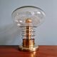 Space Age table lamp in brass and clear glass, 1960-70.