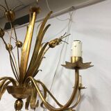 Golden chandelier of the 70s joncs decorations