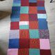 Plaid en patchwork tricoté main
