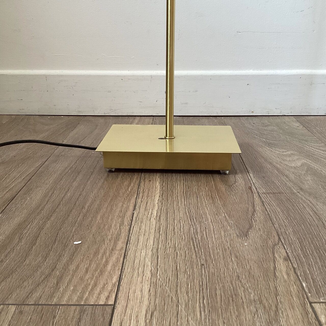 Golden lucid floor lamp