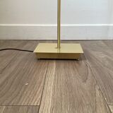 Golden lucid floor lamp