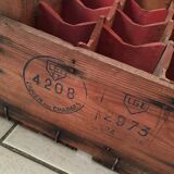 Caisse evian bottle holder