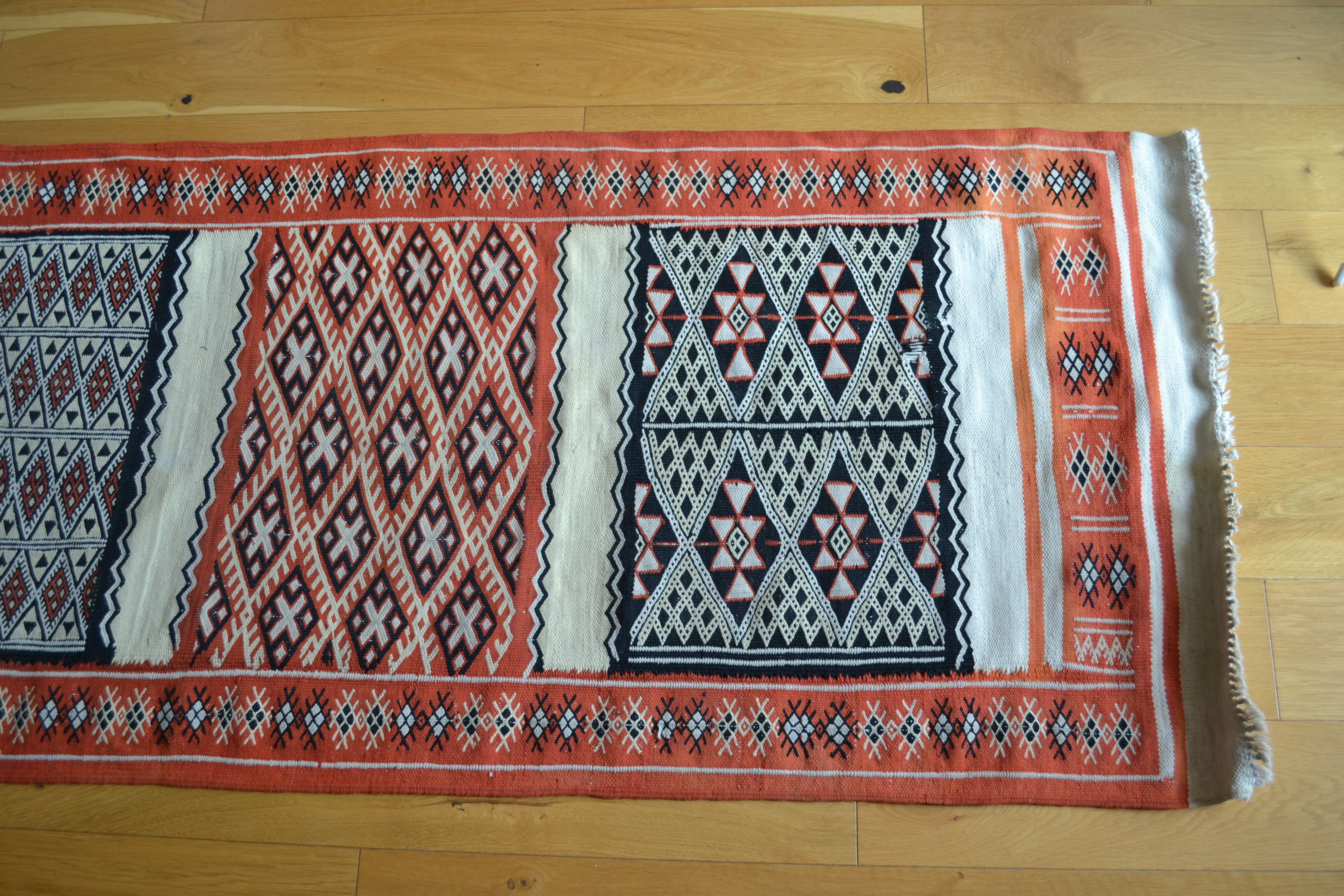Old carpet Berber corridor path