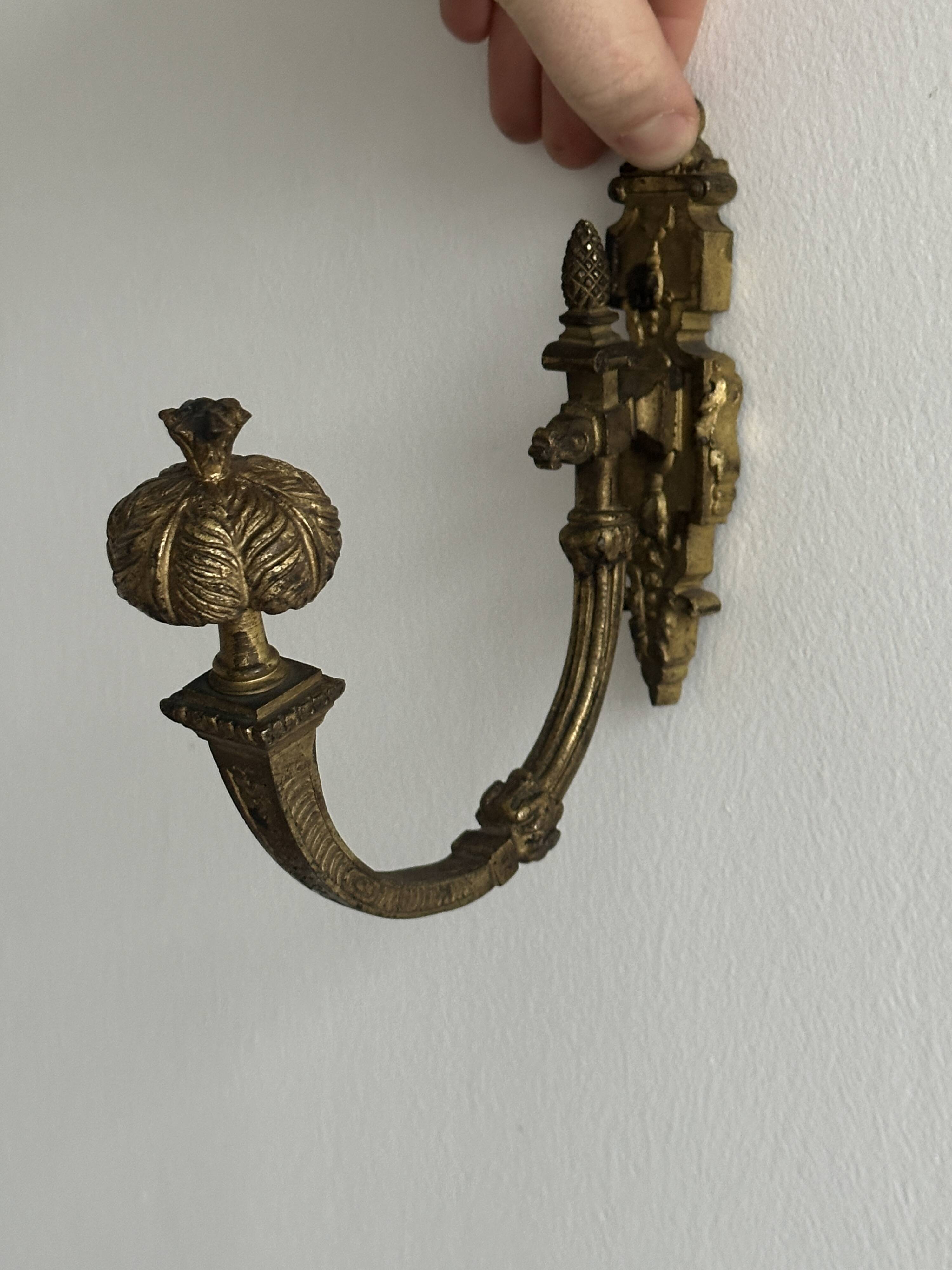 antique wall hook, gilded sculpted metal