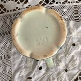 Antique pitcher in thought slip