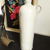 Vintage glazed stoneware bottle with handle