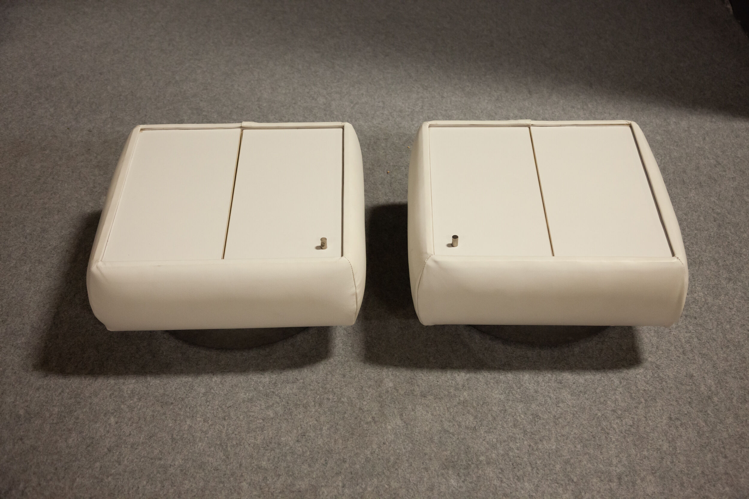 Pair of 70s white leather bedsides